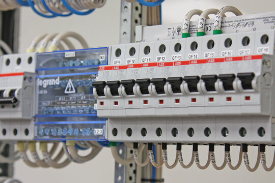 ABB current circuit breakers and voltage distribution busbars in the electrical panel.