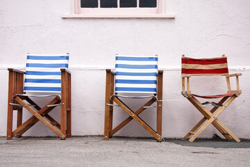 Empty deckchairs on street in British seaside town