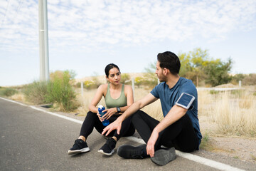 Beautiful couple talking after a run