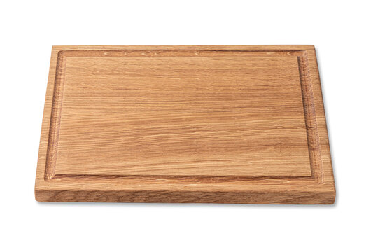 rectangular wooden cutting board with edging isolated on a white background. mockup of a food background with copy space, side view