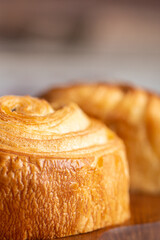 Croissant macro. French croissant with waves. Air baking. Croissant for puff pastry advertising. Croissant for a magazine.French breakfast with pastries. From puff pastry. Bun from France. Roll macro