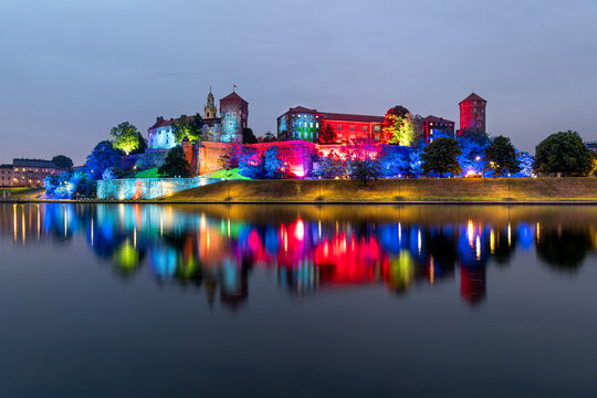 Castel Wawel in Krakow, Poland, colorfully illuminated by night