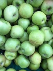 green apples in a market