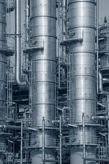 Tall steel fractionation towers at a large chemical plant