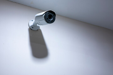 Modern CCTV camera on a wall