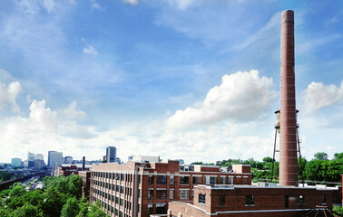 View of old tobacco warehouses in foreground with Richmond skyline in the distance