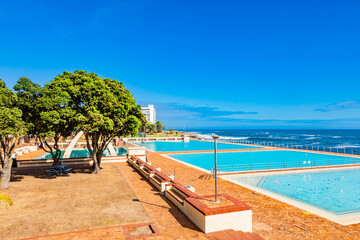 View of Pavilion Public Swimming Pool on Sea Point promenade in Cape Town