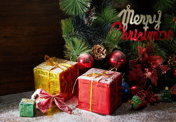 Fototapeta na wymiar Christmas background.Christmas elements, fir tree, gifts, decorations on wooden background