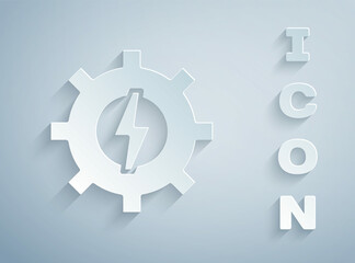 Paper cut Gear and lightning icon isolated on grey background. Electric power. Lightning bolt sign. Paper art style. Vector