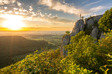 Dramatic sunset over a scenic cliff ledge in the Swabian Jura in Southern Germany