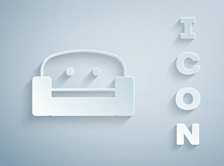 Paper cut Armchair icon isolated on grey background. Paper art style. Vector