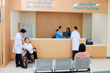 Receptionist and doctor with client. Hospital Healthcare medical and medicine concept.