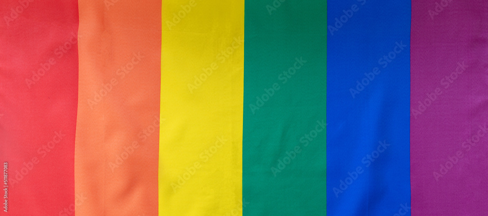 Wall mural LGBT Rainbow flag, Gay pride symbol background texture, overhead. LGBTQ community rights