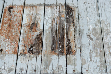 old wooden surface with peeling paint