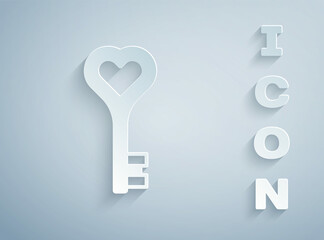 Paper cut Key in heart shape icon isolated on grey background. Happy Valentines day. Paper art style. Vector