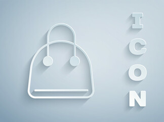 Paper cut Handbag icon isolated on grey background. Female handbag sign. Glamour casual baggage symbol. Paper art style. Vector