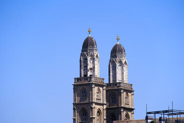Medieval old town of Z&uuml;rich with church towers of Great Minster on a sunny hot summer day. Photo taken June 19th, 2022, Zurich, Switzerland.