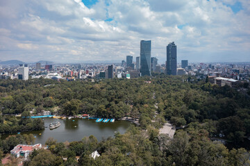 Aerial drone view of Chapultepec Park, city in the background