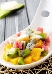 Close-up fruit salad on wooden table