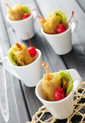 Closeup fried shrimp snack on wooden tabl