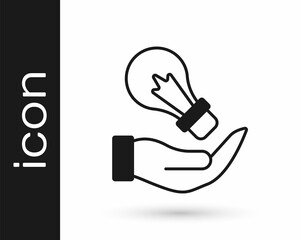 Black Light bulb in hand with concept of idea icon isolated on white background. Energy and idea symbol. Inspiration concept. Vector