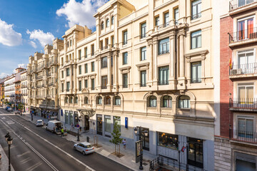 Fototapeta na wymiar Facades of urban residential buildings in Madrid's Atocha street