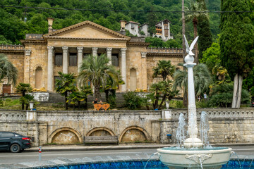 Fototapeta na wymiar Winter theatre and fountain in Gagra, Abkhazia, Caucasus