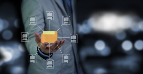 Document management system concept, business man holding folder and document icon software, searching and managing files online document database, for efficient archiving and company data