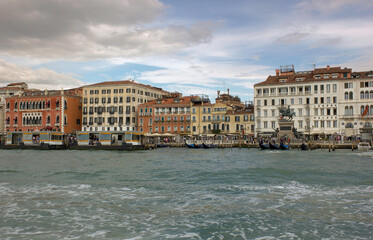 Venice, Italy: Wide angle panorama shot of sea view against main city showing statue of Bartolomeo Colleoni in Campo Santi Giovanni e Paolo