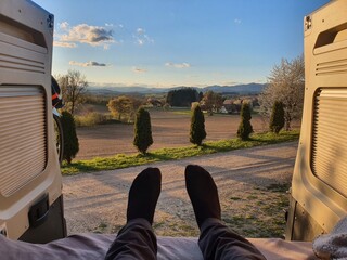View from the inside of a campervan. Relaxing scenery. Freedom concept - digital nomad life.