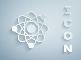 Paper cut Atom icon isolated on grey background. Symbol of science, education, nuclear physics, scientific research. Paper art style. Vector