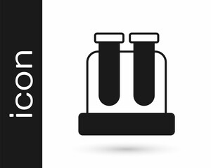 Black Test tube and flask chemical laboratory test icon isolated on white background. Laboratory glassware sign. Vector