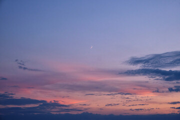 Fototapeta na wymiar CBeautiful sunset with blue and pink clouds