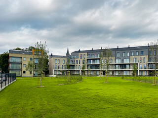 Fototapeta premium Exterior of a building with a green garden outdoors in Bruxelles
