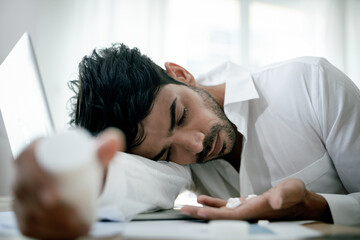 illness concept Sick and headache businessman pill in hand Feeling tired, exhausted, unconscious, overworked irregular heartbeat