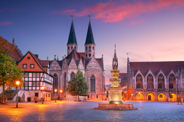 Brunswick, Germany. Cityscape image of historical downtown of Brunswick, Germany with St. Martini Church and Old Town Hall at summer sunset.