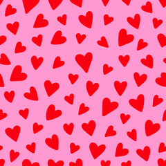 Hand drawn heart seamless irregular vector pattern. Many red hearts on a pink background.