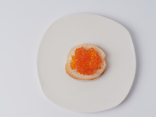 A red caviar sandwich on a plate on a white table