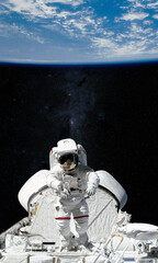 Astronaut and spaceship. Elements of this image furnished by NASA.