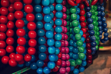 Wooden red beads on the market