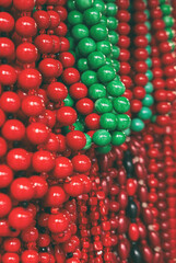 Wooden red beads on the market