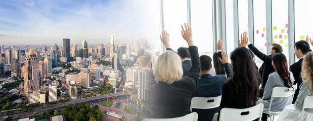 Group of business people meeting in a seminar conference widen view . Audience listening to...