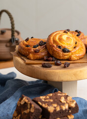 Breakfast pastries of cinnamon buns and chocolate brownies