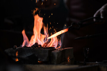 bright fire in the forge with sparks