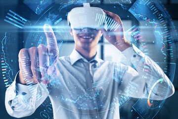 Metaverse trading and investing concept with happy young man wearing VR headset touching digital interface terminal with data, double exposure