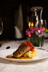 Grilled fish, mashed potatoes, passion fruit sauce, wine