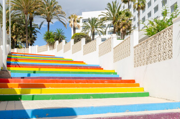 Colorful stairs in the small touristic town of Nerja on the sunny Costa Del Sol in the province of Malaga in Spain - 511919255