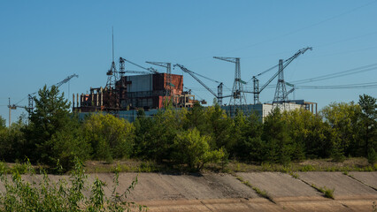Abandoned fifth and sixth unfinished power unit Chernobyl nuclear power plant on a summer sunny...