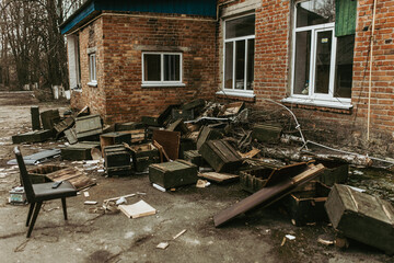 Boxes with weapons left by Russian troops in a Ukrainian village