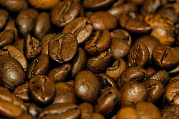 Close up of roasted coffee beans can be used as background